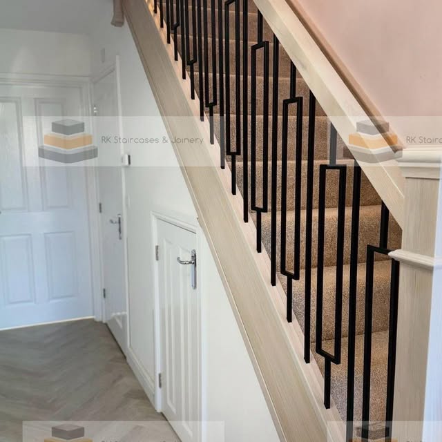 Oak handrail with geometric metal spindles